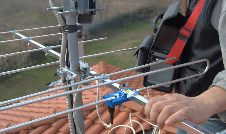 TV antenna being installed on a Perth roof