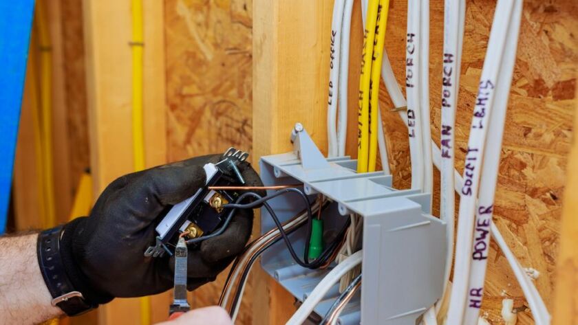 DeltaPrime electrician during an electrical installation