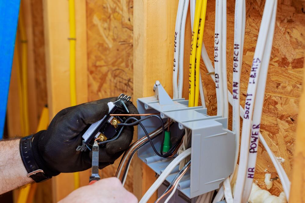 DeltaPrime electrician during an electrical installation